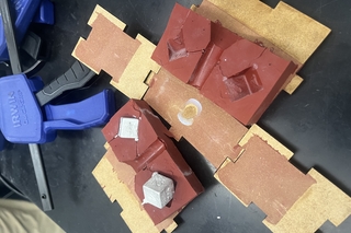 the mold with the dice in it