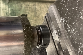 CNC drilling into ring with three holes