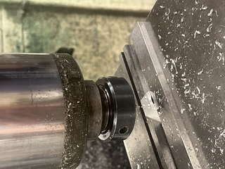 CNC drilling into ring with three holes